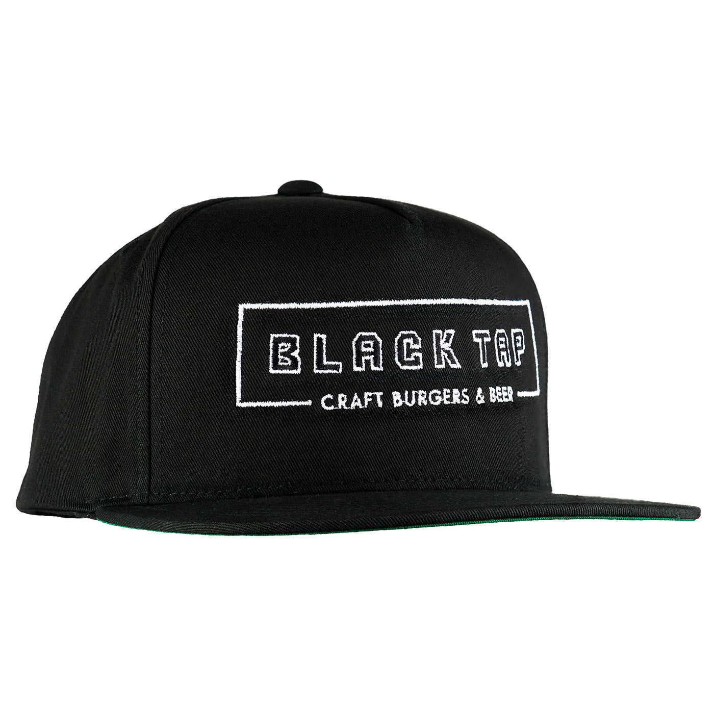 side view of black snapback with black tap logo